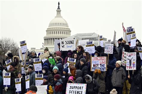Advocates rally outside HHS headquarters to protest children's health funding reductions