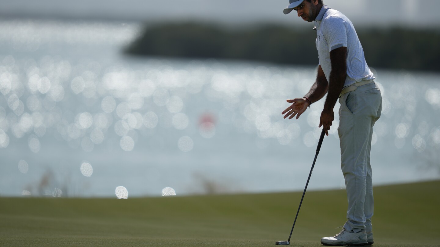 Tommy Fleetwood celebrates his eagle during his third-round 67