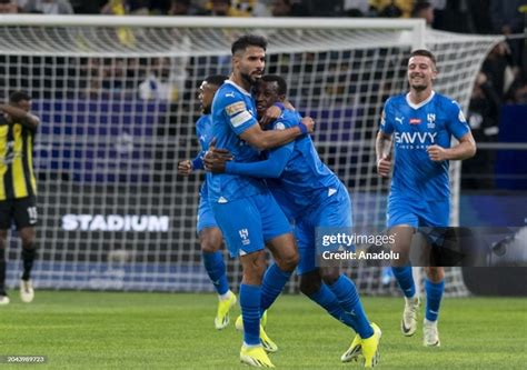 Al-Hilal players celebrate a crucial goal in their recent league match.
