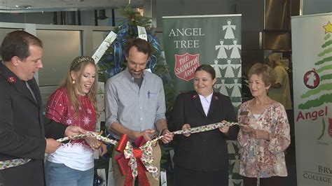 Community members participate in the mall's holiday coat drive.