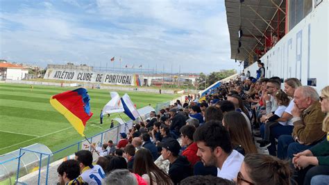 The passionate home supporters at Estadio da Tapadinha creating an electric atmosphere.