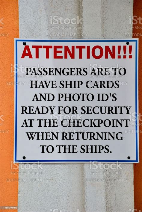 Safety signage on a cruise ship deck highlighting water risks.