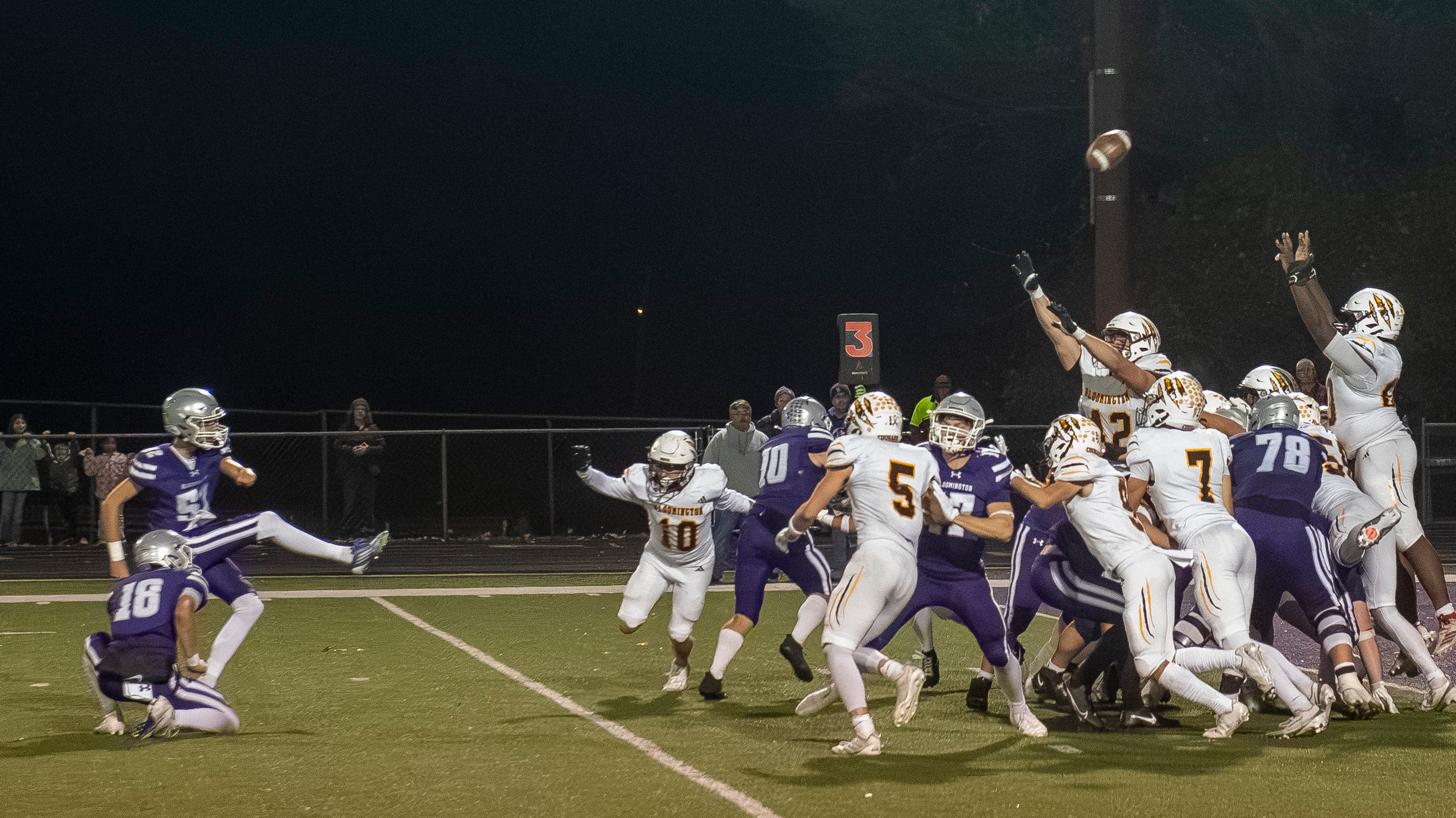 Townsend carries the ball against North's defense during the sectional championship.