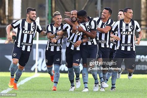 Botafogo players celebrating a goal in their match against Sport Recife.