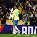 Casemiro curls home Brazil's second goal from a Rodrygo free-kick.