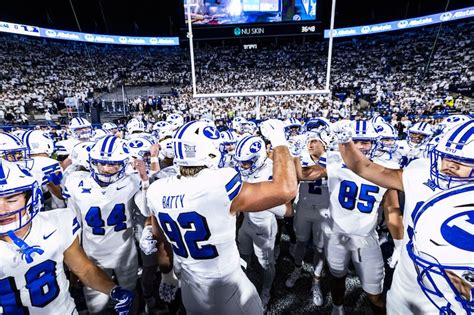 BYU's team huddle during a game at LaVell Edwards Stadium.