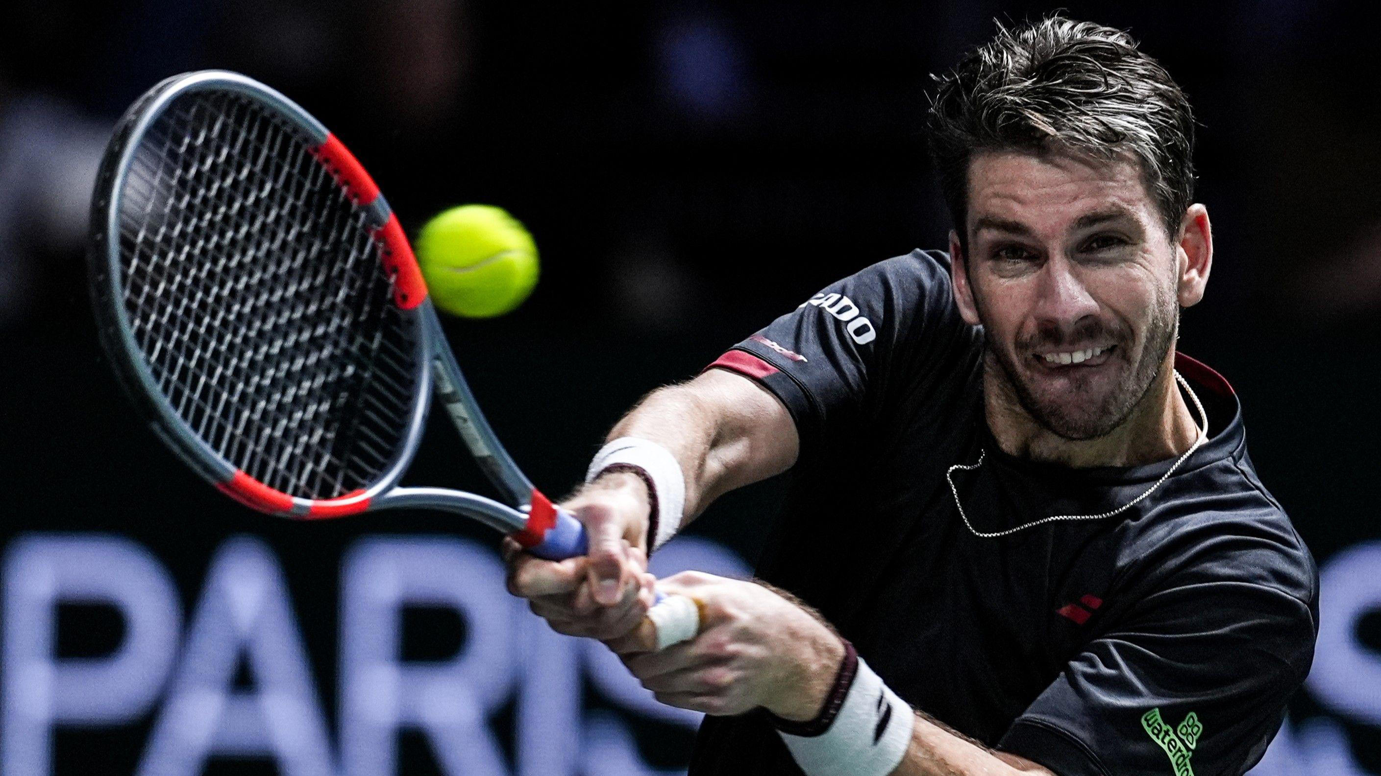Norrie receives medical attention during his quarter-final match against Kyrian Jacquet.