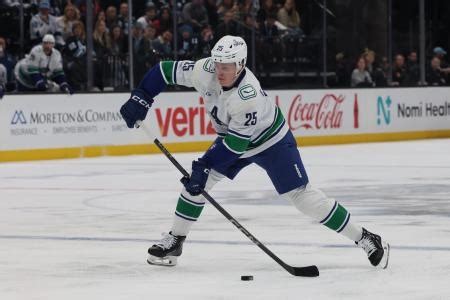 Elias Pettersson controls the puck during Canucks' recent game against Tampa Bay
