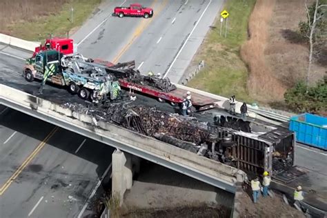 Legal team investigating a commercial truck accident scene, gathering critical evidence for liability claims.