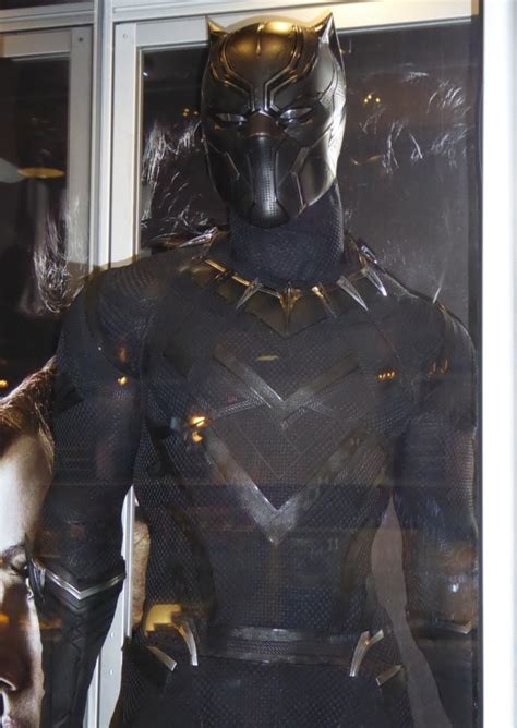 Boseman in his iconic Black Panther suit, a role that redefined superhero cinema.
