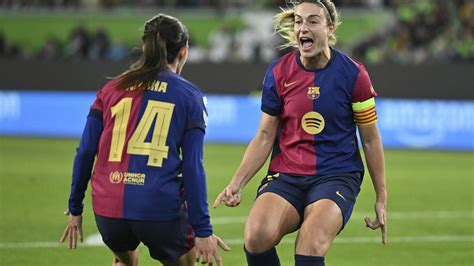 Alexia Putellas and Aitana Bonmati control the midfield for Barcelona.