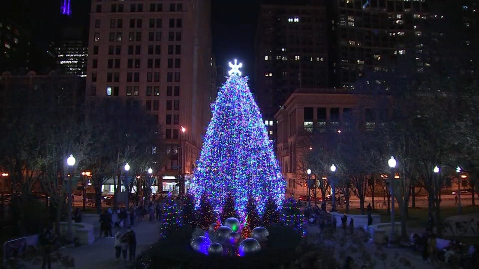 Festive crowd gathered for Chicago's Christmas tree lighting just hours before the shooting.