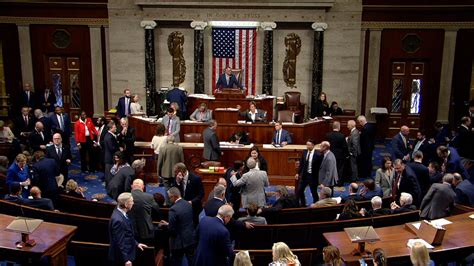 Lawmakers voting on the Epstein files resolution in the House chamber.