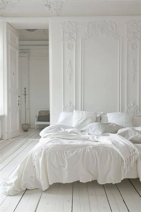 A restful bedroom showcasing Cloud Dancer's calming, expansive qualities.