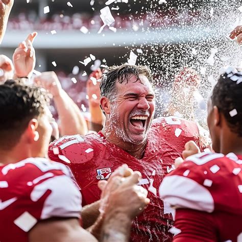 Players celebrate after advancing to the College Football Playoff National Championship.