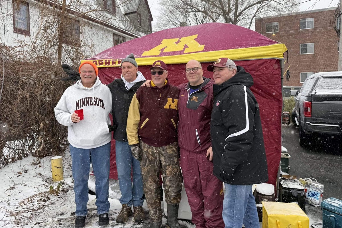 Fans tailgating before the big game.
