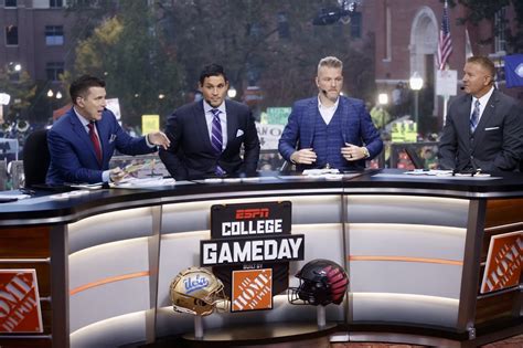 ESPN's College Game Day crew broadcasting live from Eugene with Autzen Stadium in the background.