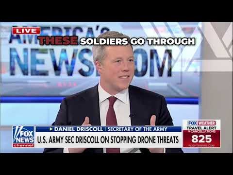 Driscoll presenting his vision for ethical AI development at a global tech summit