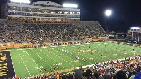 Wake Forest players huddle during a home game at Allegacy Stadium.