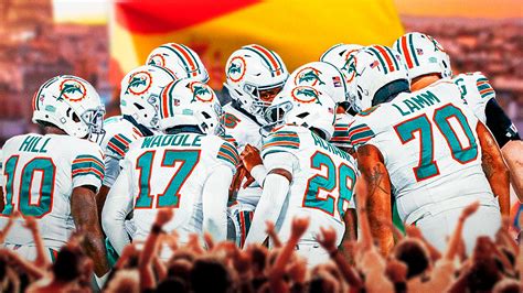 Miami Dolphins players arriving in Madrid, excited for their historic Week 11 matchup against the Washington Commanders.
