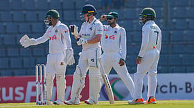 Players and umpires pause play during earthquake interruption at Shere Bangla National Stadium