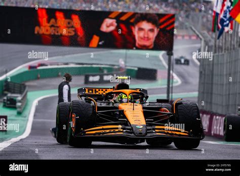 Lando Norris celebrates after securing pole position for the Sao Paulo Grand Prix.