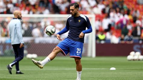 Young midfielder Rayan Cherki in action for France