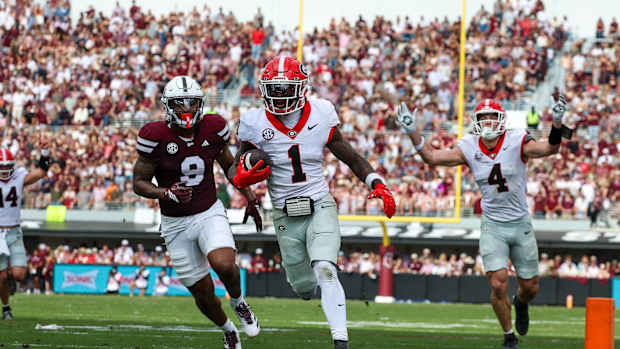 Zachariah Branch celebrates after his 40-yard touchdown reception against Georgia Tech.