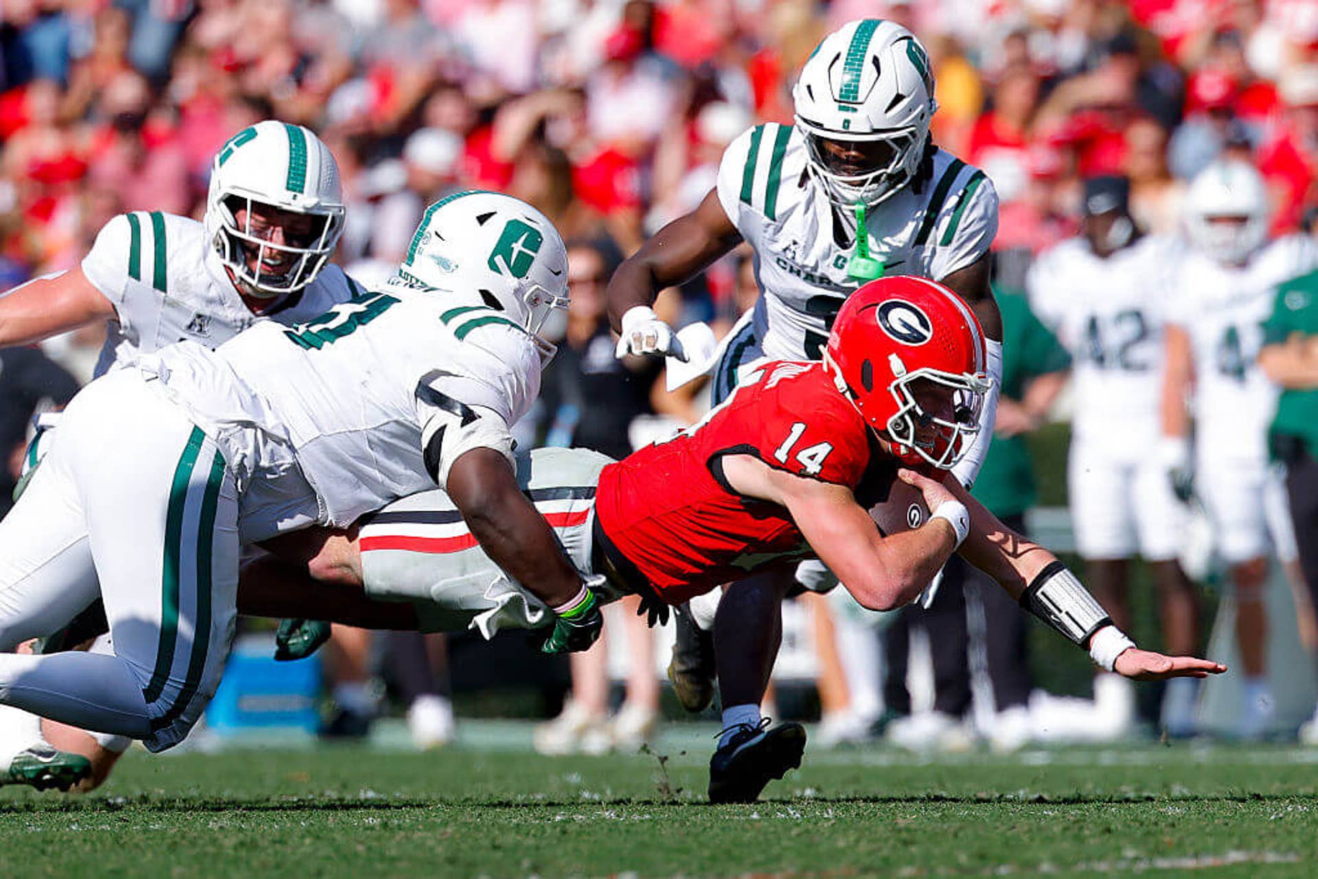Georgia Tech's defense pressures Gunner Stockton during the Clean Old-Fashioned Hate rivalry game.