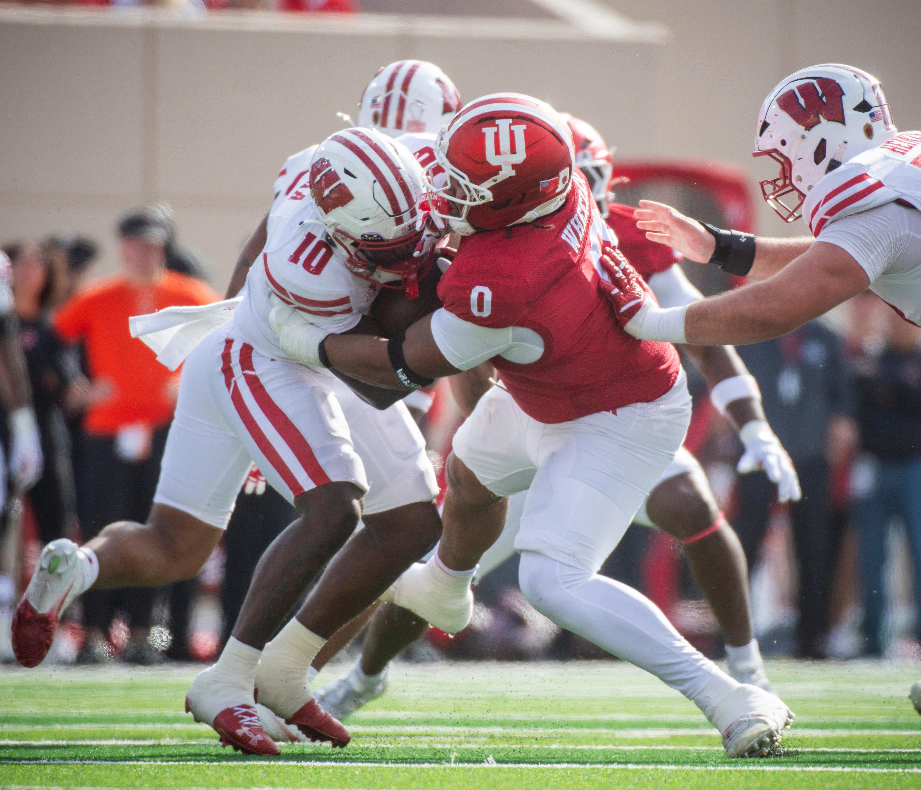 Ituka lies motionless after a brutal hit from Indiana defenders in the third quarter.