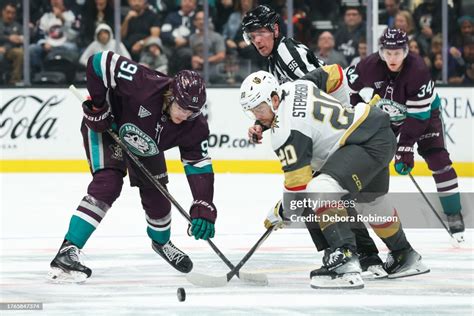 Leo Carlsson battles for puck possession against Vegas defenders.