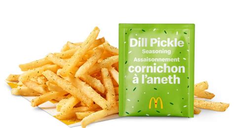 Customers toss fries and dill pickle seasoning in the special McShaker bag