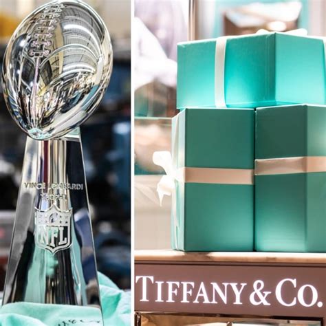 Professional silversmiths crafting the iconic Lombardi Trophy at Tiffany & Co's Rhode Island facility.