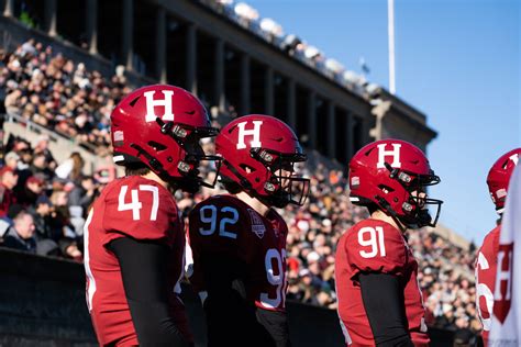 Players collide during a historic Harvard vs. Penn matchup.