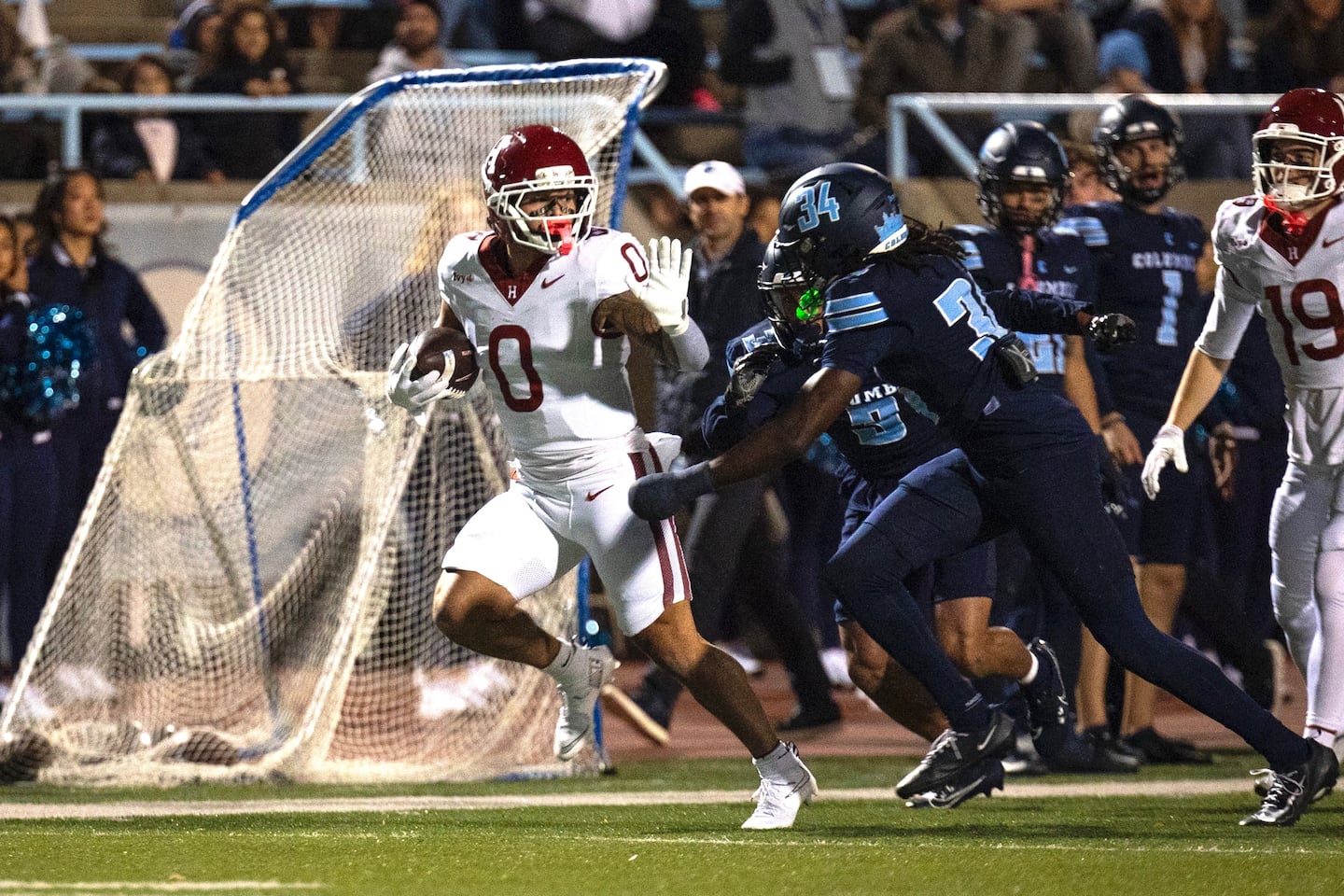 The Crimson celebrates after a key touchdown during their undefeated season.