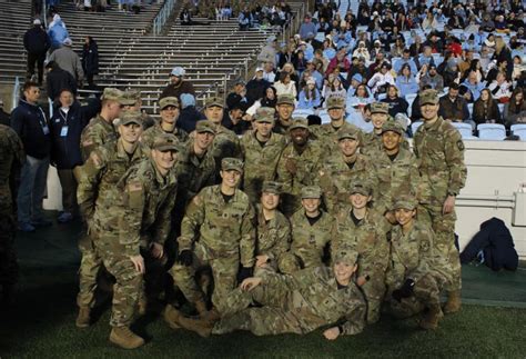 ROTC cadets rappelling from Gies Memorial Stadium during pre-game ceremonies