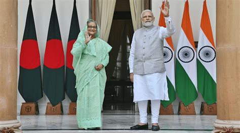 Diplomatic representatives from India and Bangladesh in a meeting.