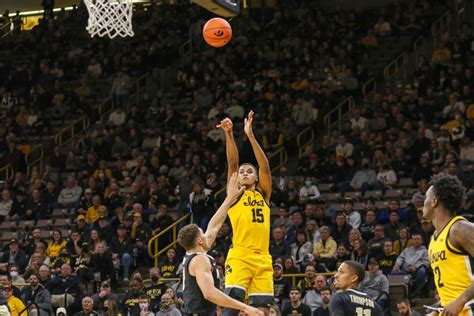 Keegan Murray's electrifying dunk against Purdue exemplifies his impact on the court.