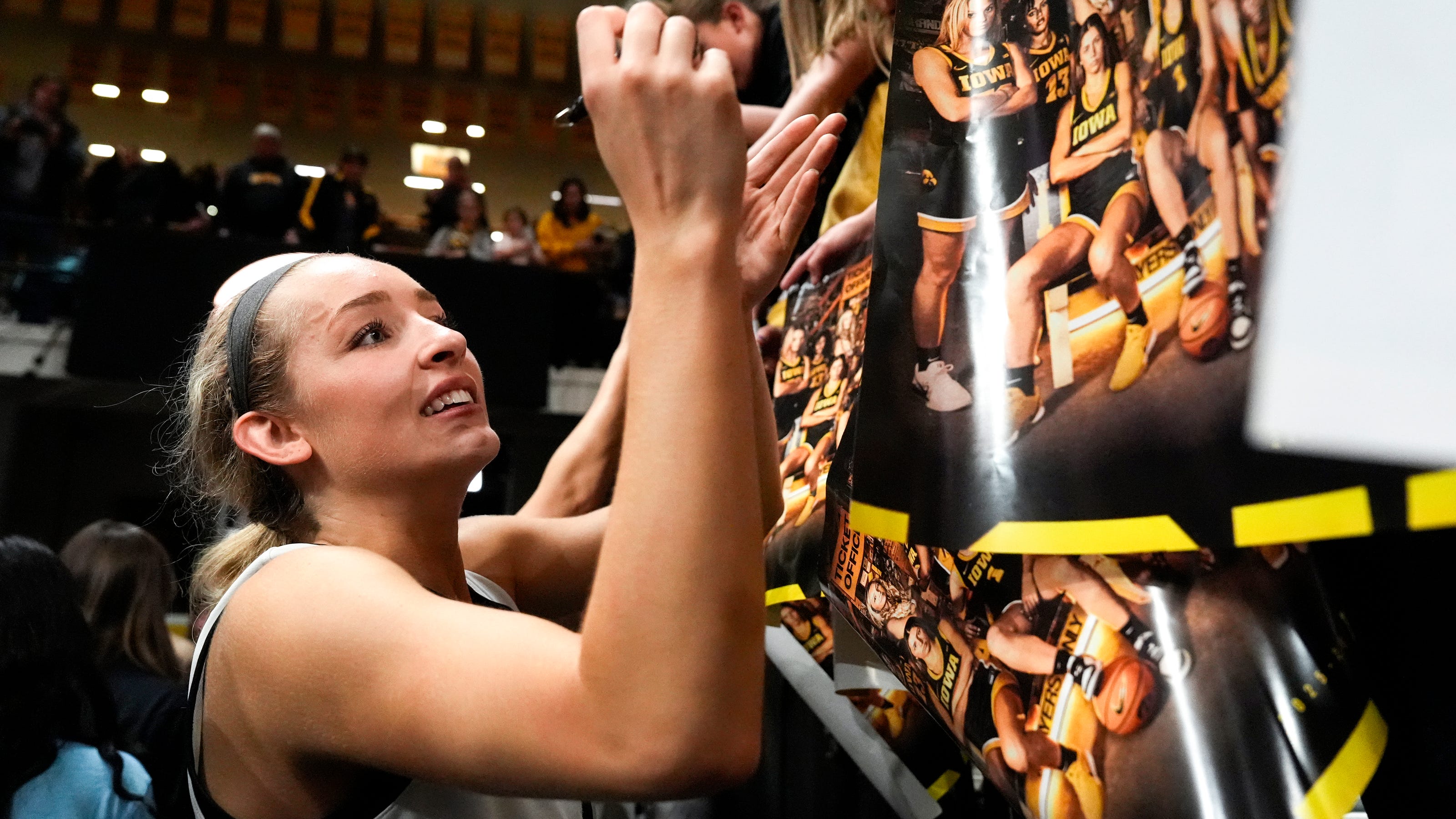 Baylor's defensive trio looks to contain Iowa's scoring attack.