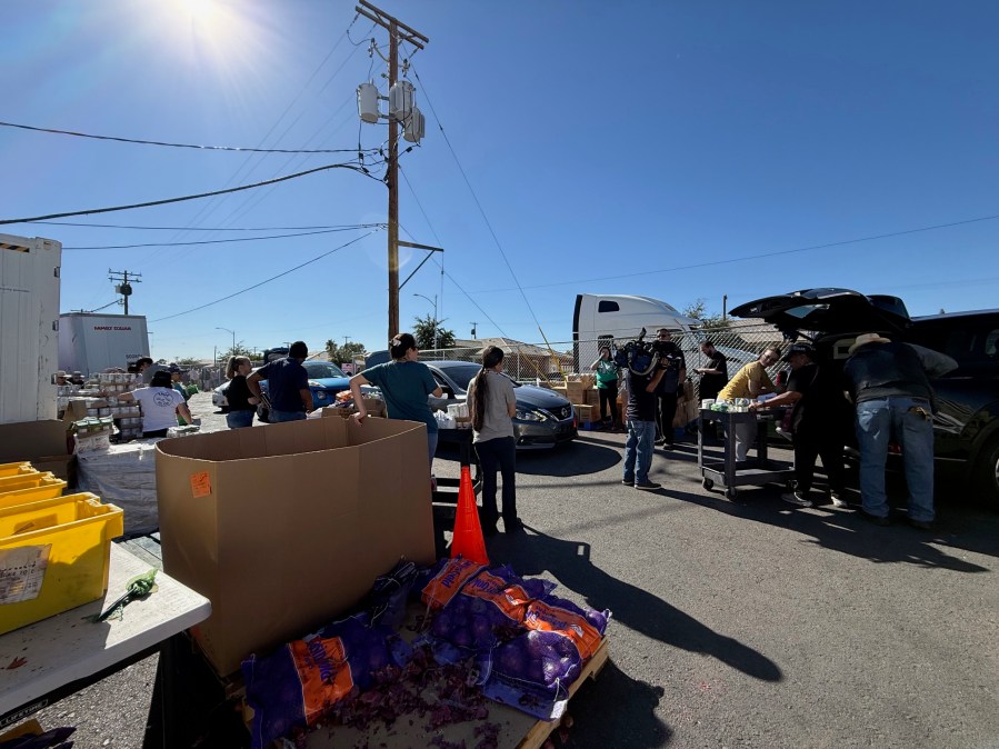 Nevadans wait in line at a food bank as SNAP benefits face uncertainty during the federal shutdown.