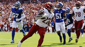 The young athlete showcasing his defensive skills on the court.