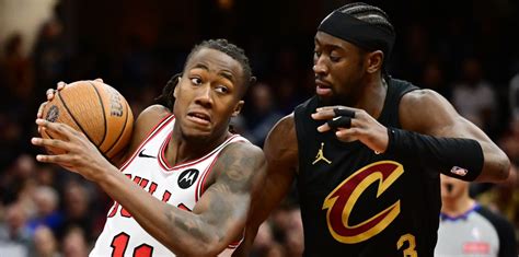 Smith reacts immediately after suffering the shoulder injury in Denver.