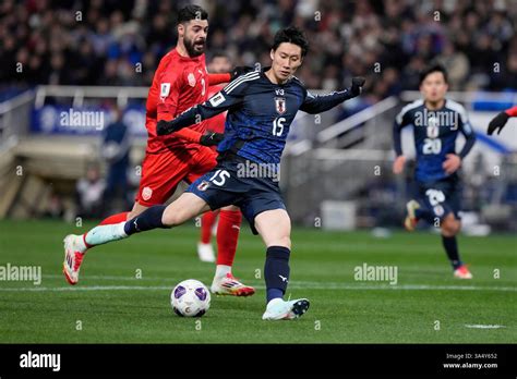 Daichi Kamada celebrates after opening the scoring for Japan in the fifth minute.