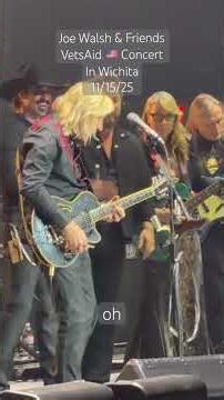 Joe Walsh delivers an electrifying guitar solo during his 9th Annual VetsAid concert at Intrust Bank Arena.