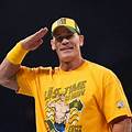 John Cena holds up the Intercontinental Championship, adding another prestigious title to his legendary career.