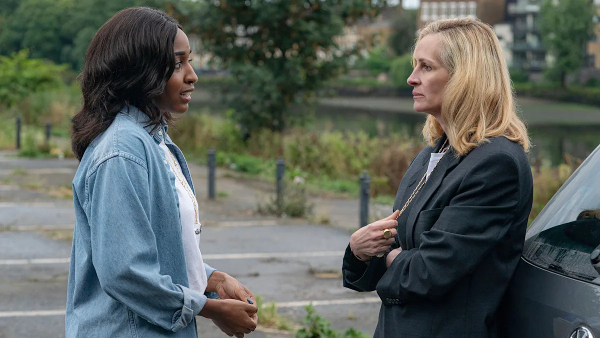 Director Luca Guadagnino working with Julia Roberts during filming of 'After the Hunt'
