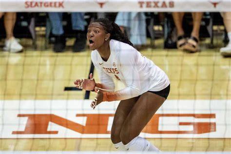 Texas Longhorns' Torrey Stafford spikes during the championship match against Kentucky.
