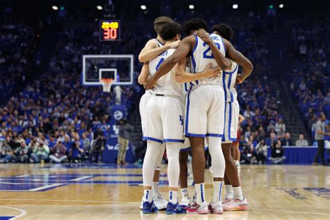 Kentucky Wildcats huddle during a timeout at Rupp Arena.