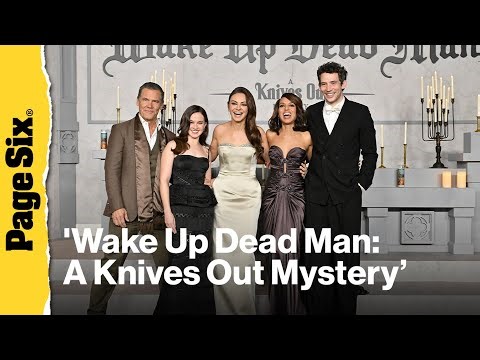 The star-studded cast of 'Wake Up Dead Man' poses together on the red carpet.