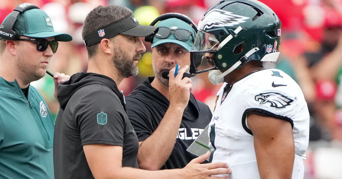 Head coach Nick Sirianni confers with offensive coordinator Kevin Patullo during a game.